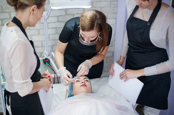 Esthetician receiving SQT certification training